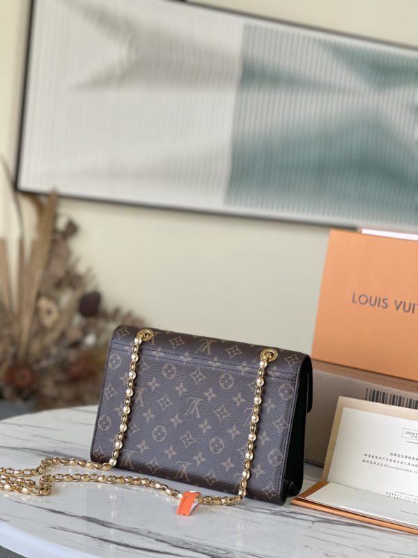 Louis Vuitton Victoire Monogram Canvas Calf Leather Bag - Image 5